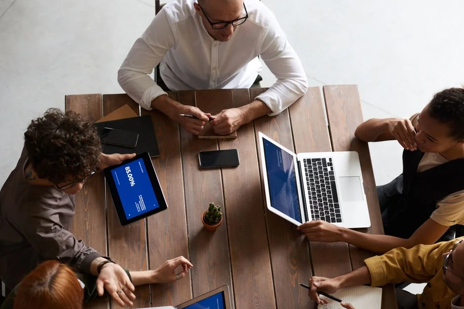 Close-up of various marketing documents on a desk, perfect for business and strategy discussions.